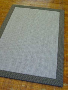 Custom bordered area rug